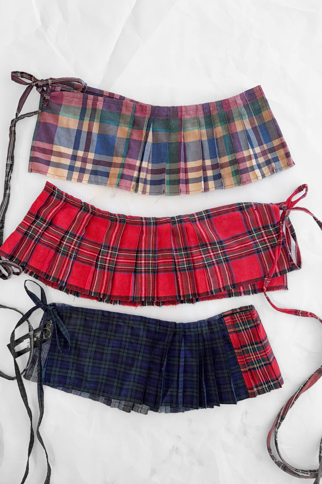 Red Tartan Pleat Belt by Laurence Sabrine